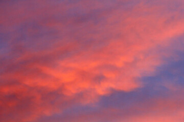 Fototapeta premium Fiery Looking Clouds at Sunset in Winter