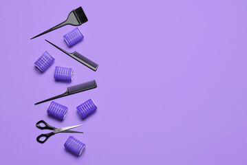 Hair curlers, brush, combs and scissors on color background - obrazy, fototapety, plakaty