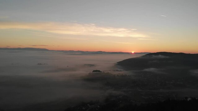 Beautiful sunrise shoot Drone shoot,moody green, green woods, clouds, sunrise , sunny day, woods, afternoon Europa SLOVENIJA, Ljubljana, prodia, from back, church religion front to back