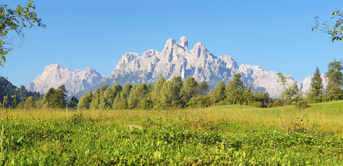 Landscape of the Dolomites mountains on a sunny day, Italy. Panorama.
