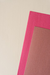 paper background in brown and red/pink