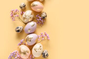 Composition with Easter eggs and gypsophila flowers on color background