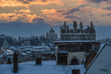 Ukraine, Lviv, VUL. VICHEVA, 2 - January, 2022: Mannerist attic of tower of CHURCH OF ALL SAINTS (FORMER BENEDICTINE CHURCH).