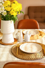 Stylish table setting and flowers for International Women's Day celebration