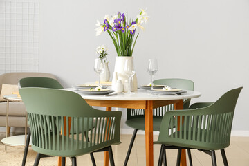 Dining room with table served for International Women's Day celebration