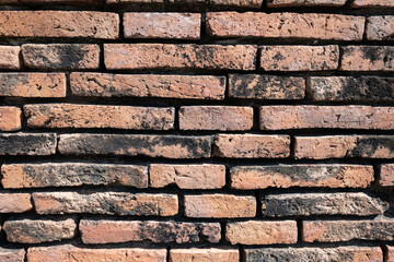 brick wall texture background for design and creative use, old antique stone wall texture background at ancient archeological site.	