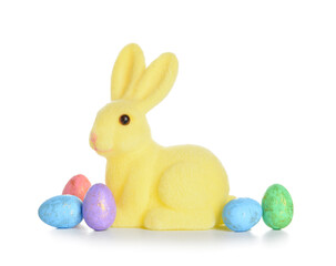 Cute Easter bunny and eggs on white background