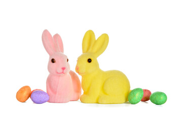 Cute Easter bunnies and eggs on white background