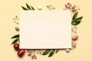 Easter composition with blank card, flowers and eggs on beige background