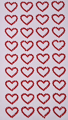 Red heart stickers made from little beads