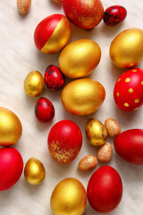 Stylish Easter eggs on light background