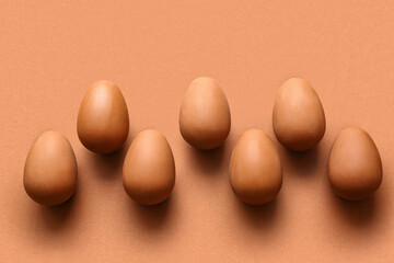 Composition with tasty chocolate Easter eggs on color background