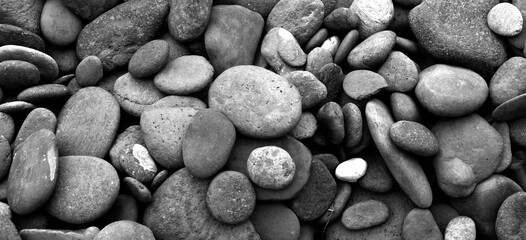 Fototapeta na wymiar Small pebbles decorate the pool trough.