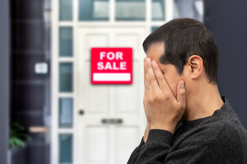 Man extremely depressed and sad about losing his house key and seeing a for sale sign, real estate...