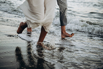 person on the beach  legs love run sea ocean sand water
