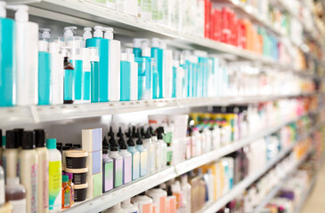 Large assortment of hair care products in special cosmetics store.