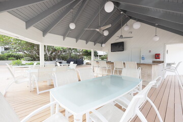 table and chairs near the beach 