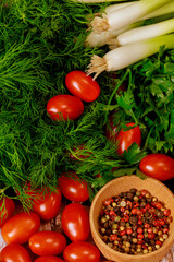 Red cherry tomatoes, green onion and dill.