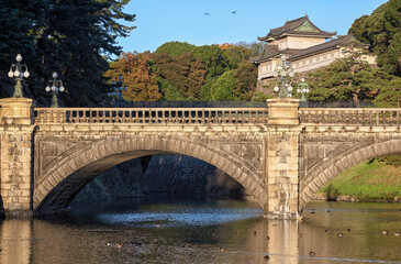 Fototapeta na wymiar Stone bridge and Fushimi Turret at the Imperial Palace Main Gate
