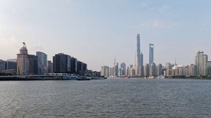 Landscape of Shanghai skyline viewed on Huangpu river, landmarks in Lujiazui Pudong district.