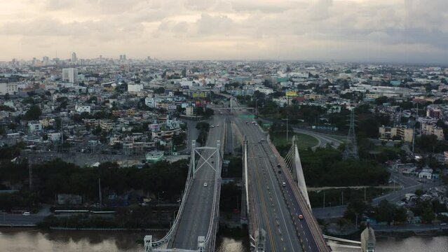 AERIAL - Duarte Bridge at sunrise in Santo Domingo, Dominican Republic, forward