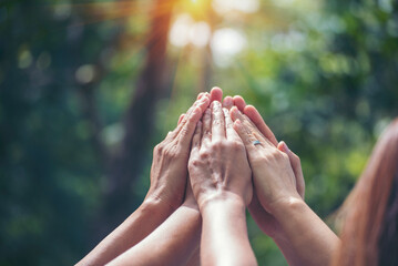 Diversity multiethnic high five group of business people success team hands together. Collaborate...