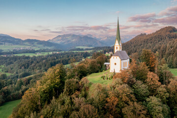 small chapel in the hills of Austria during an autumn sunset