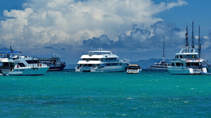 Galapagos cruise ships moored in the harbor in Puerto Ayora, Santa Cruz Island, Galapagos, Ecuador