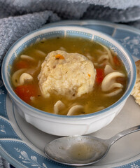 Matzo ball soup with chicken and noodles, like my grandma used to make