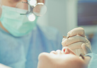 Team surgeon at work in operating room