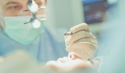 Team surgeon at work in operating room