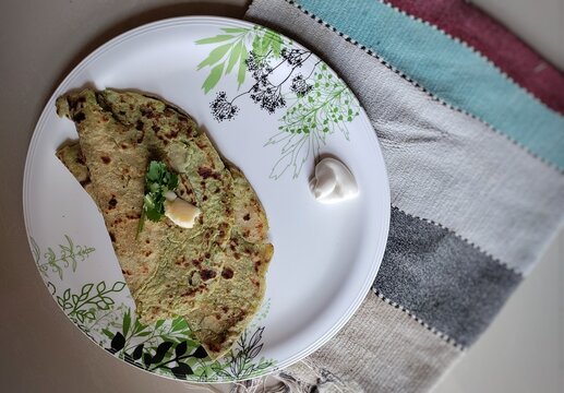 Aloo Matar Paratha or  Indian Potato stuffed Flatbread.