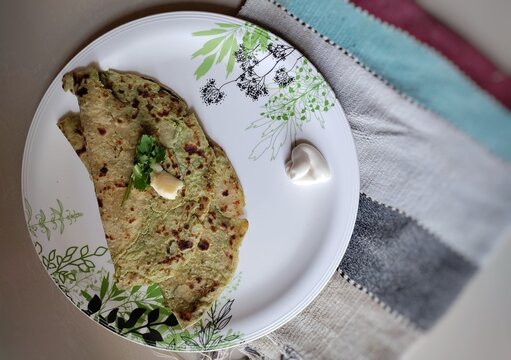 Aloo Matar Paratha or  Indian Potato stuffed Flatbread.