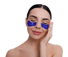 Beautiful young woman with under eye patches on white background