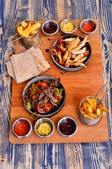 A delicious menu of steak and chicken fries. 