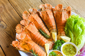 Flathead lobster shrimps served on white plate seafood sauce, fresh slipper lobster flathead boiled...