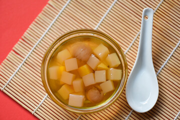 Chinese desserts, Mix ginkgo nuts cassava syrup coconut jelly in longan juice on glass bowl, Thai...