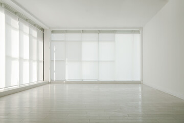 Fototapeta na wymiar Empty room with panoramic windows and white wooden floor