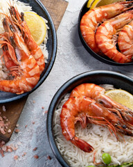 Shrimps with rice on light gray background.