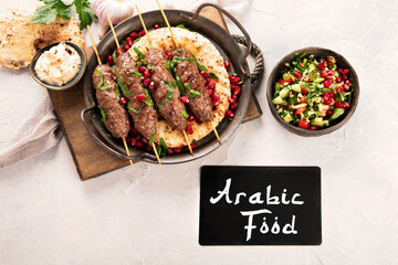 Kebab with pita on light background.
