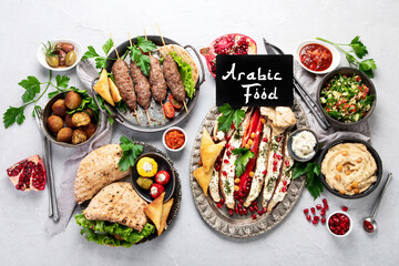 Lebanese food assortment on light background.