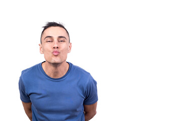 Portrait of a smiling man blowing a kiss