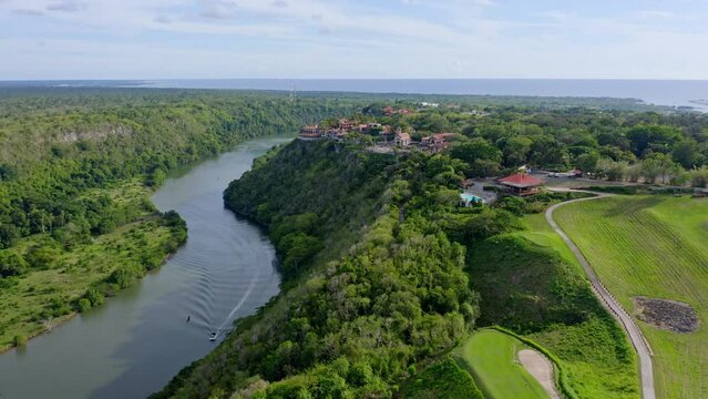 Beautiful aerial shot of the medieval town Altos de Chavon in Casa de Campo, la Romana, in the Dominican Republic, river chavon in view
