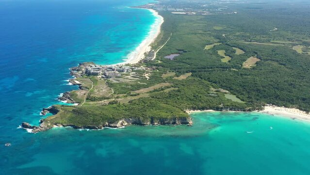Macao beach with turquoise water and stone cliff. Dominican Republic. Aerial drone view