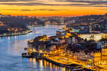 Fototapeta na wymiar The old town of Porto with the river Douro after sunset