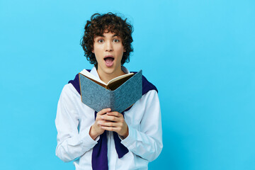 curly guy with a book college learning jacket isolated backgrounds