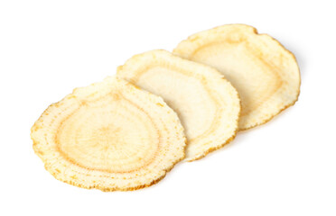 Close up of ginseng slices isolated on white background.