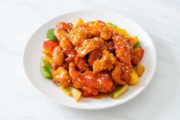 fried crispy chicken with sweet and sour sauce