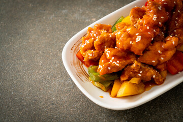 fried crispy chicken with sweet and sour sauce