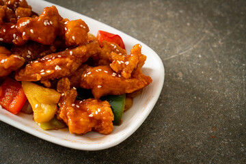 fried crispy chicken with sweet and sour sauce